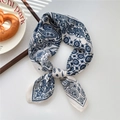 Beige and blue paisley square scarf tied in a knot on a rustic lifestyle background - 37SR-Paisley Lotus Grid Beige