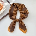 Striped neck scarf in brown and orange tones tied as a chic fashion hair accessory - Five Stripes Brown (31SR)