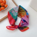 Abstract print silk scarf with colorful pattern tied in a stylish bow on white background - 53x53cm / Color Block Red Scenery