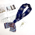 Blue paisley satin skinny scarf with floral pattern on white flat lay background - Paisley Blue