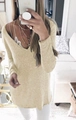 Detail view of a V-neck knit sweater in light beige with fine ribbed texture and long sleeves - S / Tops / Khaki