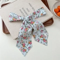 Light blue floral skinny scarf tied as a bow with delicate pink and yellow flower patterns - 02 Tie-Peony Blue