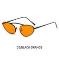 Cat eye metal sunglasses featuring black frames and vibrant orange lenses, model C6 - Black Frame Orange Lens