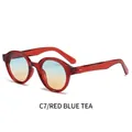 Translucent red oval sunglasses with blue-tea gradient lenses and metal rivet details - Translucent Red Frame Blue-Tea Gradient Lens