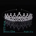 Detail of silver alloy princess crown with sparkling rhinestones on black background - Size 7