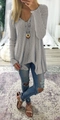 Detail of grey ribbed knit tunic featuring deep V-neck and asymmetrical hemline cut - S / Tops / Gray