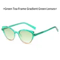 Occhiali da sole cat-eye con montatura verde tè e lenti sfumate su sfondo bianco - Montatura Tè Verde Lenti Sfumate Verdi