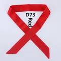 Detail view of a long red satin scarf D73 with a smooth glossy finish and diagonal ends - 100x4cm / Red