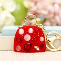 Red luxury pearl handbag keychain charm with sparkling rhinestones and golden metal ring - Red Jelly Bag