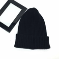 Classic black knitted beanie hat for winter warmth with high-quality yarn texture - One Size (High Elasticity) / Black
