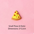 Detail of pizza-shaped resin DIY accessory with cartoon face and red dots on pink surface - Small Pizza 4 Dots