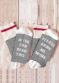 Detail of grey sock soles with white funny wine slogan lettering on wood background - One Size / Light Grey and White Type 1