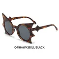 Avant-garde bat-shaped sunglasses featuring a tortoise frame and black-grey lenses - Tortoiseshell Frame Black Grey Lens