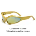 Futuristic Y2K wave frame sunglasses with yellow lenses and golden metallic finish - Yellow Frame Yellow Lens