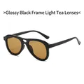 Lunettes de soleil aviateur tendance avec monture noir brillant et verres thé clair - Monture Noire Verre Thé Clair
