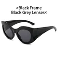 Y2K oval oversized sunglasses featuring black wave frames and dark gray lenses - Black Frame Grey Lens