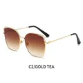 Occhiali da sole cat-eye da donna con montatura dorata, strass e lenti color tè sfumate - Montatura Oro Lente Tè Sfumata