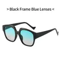 Chic oversized black frame sunglasses with blue gradient lenses for fashion-forward styling - Black Frame Blue Lens