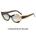 Occhiali da sole cat eye con montura nera e ambra e lenti sfumate dal blu al giallo - Montatura Nera / Lente Blu-Giallo