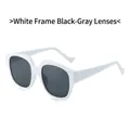 Oversized white frame sunglasses with dark gray lenses and wavy temple tips for fashion - White Frame Dark Grey Lens