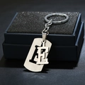Brushed stainless steel letter E keychain gift set in a black lined presentation box - Letter E / Silver