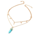 Bohemian layered gold necklace featuring star moon charms and turquoise hexagonal pendant - Turquoise