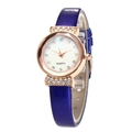 Elegant women's quartz watch with rose gold diamond case and blue leather strap - Blue