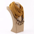 Ginger yellow chiffon scarf necklace with faceted amber gemstones on a display bust - Leaf Yellow
