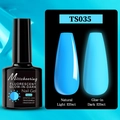 Luminous blue gel nail polish showing daylight color and neon glow effect in the dark - Fluorescent Glow Gel TS035 (Sky Blue)
