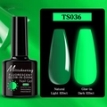 Luminous neon green nail gel polish TS036 showing glowing effect in 7.5ml UV LED bottle - Fluorescent Glow Gel TS036 (Emerald Green)