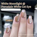 Vue macro du vernis à ongles œil de chat 008 avec reflets magnétiques argentés brillants - Gel Œil de Chat Blanc Clair de Lune 08