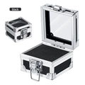 Close-up of portable nail drill bit organizer box with aluminum frame and glass lid - Black