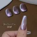 Macro shot of Blue Tears cat eye nail polish 004 with purple and blue shimmering effect - Blue Tears Cat Eye Gel 04 (Purple Blue Polarized)