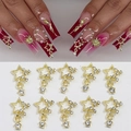 Detail of 10pcs gold star nail art charms with hollow design and sparkling rhinestones - 10pcs Hollow Star Pendant (Gold)