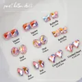 Macro detail of aurora pink glass crystals in various shapes for nail art decoration - Square/Butterfly/Oval/Asymmetric Heart/Axe Mixed / Aurora Pink (K9 Series 02)