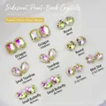 Macro shot of assorted aurora yellow K9 glass crystals for nail art in mixed shapes - Rectangle/Gem Flower/Teardrop/Star/Butterfly Mixed / Aurora Yellow (K9 Series 03)