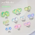 Dettaglio di strass in cristallo K9 per nail art in varie forme come cuori e ovali - Serie Colorata (Serie K9 08)