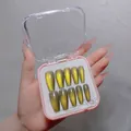Detailed view of 10pcs golden cat-eye gradient press-on nails in a pink storage box - Handmade Custom Cat Eye Press On Nails 14