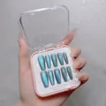 Detail of gradient blue cat eye press-on nails with shiny glitter in a pink portable box - Handmade Custom Cat Eye Press On Nails 15