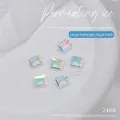 Vue macro d'un cristal K9 rectangulaire aurore 10x8mm pour nail art sur socle blanc - Grand Rectangle