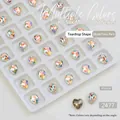 Macro shot of 8x6mm teardrop K9 nail art crystals with iridescent aurora facet finish - Teardrop (8*6mm)