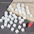Close-up of 50pcs 10mm white cube nail sponges for gradient manicures and blush effects - 50 Beads / White