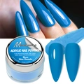 Vista macro della polvere acrilica blu neon con barattolo da 28g ed effetto nail art stiletto - Blu Danubio Neon (AC47)