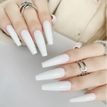 Glossy white extra-long coffin press-on nails in a ballerina shape on a model hand - Glossy Solid White (C-KS01)