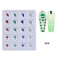 Macro detail of mixed alloy nail charms including planet and heart shapes in a display box - Planet Water Drop Alloy Set (07#) / 20 Pieces Set