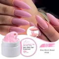 Macro view of 03 Pink non-stick solid nail extension gel being rolled by hand - Non-Sticky Solid Color 03 (Pink)