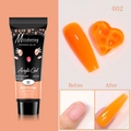 Détail du gel d'extension acrylique orange néon avec tube de 15 ml et rendu sur ongle - Orange Néon (02)
