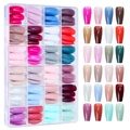 Macro detail of 24-color coffin press-on nail set in a clear plastic storage box - 24-Grid Mixed Color Nails 02 (Long Trapezoid/Ballet/Multicolor)
