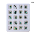 Close-up of 20 emerald green alloy nail art charms with gold settings in a white tray - Green Alloy Decoration (02#)