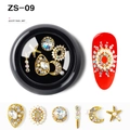 Alloy nail art kit ZS-09 with gold charms, rhinestones and pearls on red manicured nails - Star Moon Pearl Gold Rhinestone Style (ZS-09)